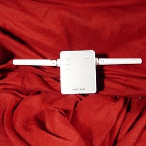 NETGEAR AC750 Dual Band WiFi Range Extender (EX3700-100NAS) Compact Wall Plug